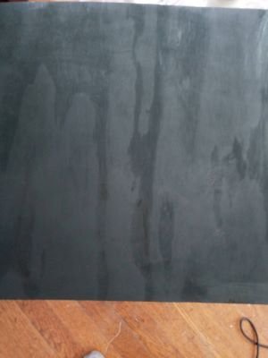 Painted wood black.