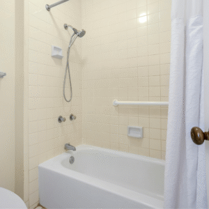 Bathtub and shower combination with safety bars