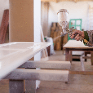 A piece of furniture being repainted and repurose.