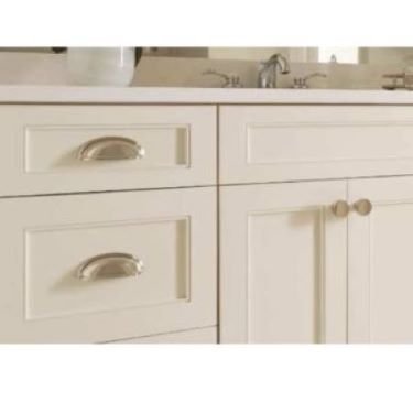 Updating kitchen cabinets door and drawer knobs.