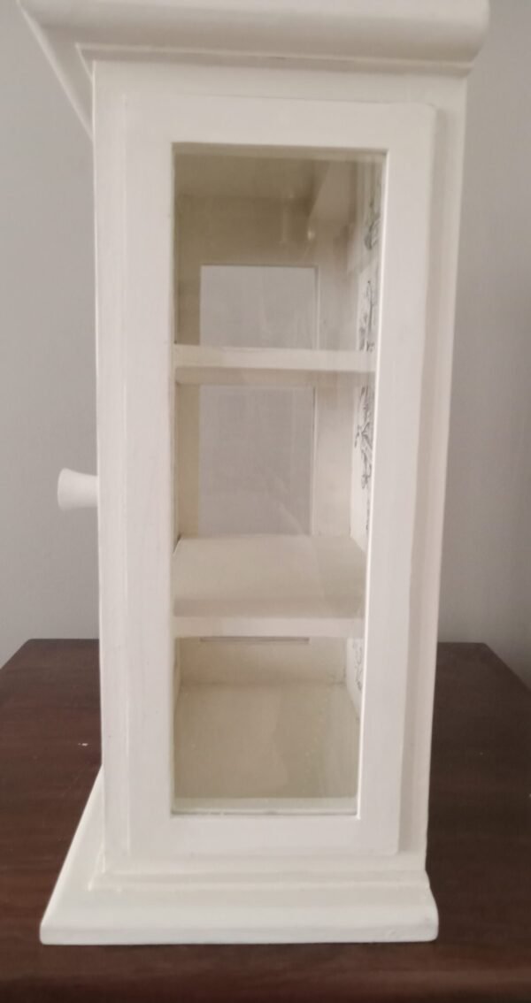 small cream curio shelf