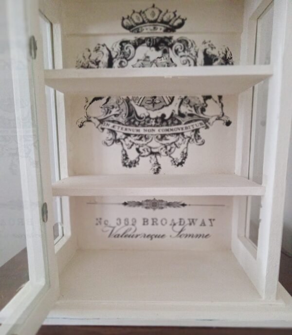 small cream curio shelf