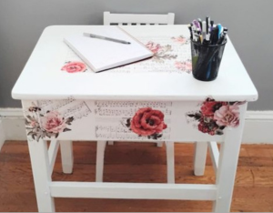 White desk with floral furniture transfer.