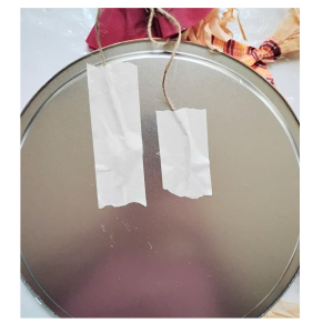 Added tape to hold the twine in place.