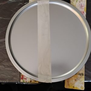 Pizza pan taped in the middle