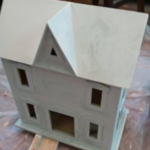 Painted white Santa house