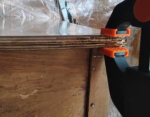 Damage wood desk glued and clamped