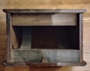 Removal of the back of a bread box.