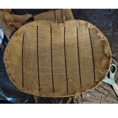 Burlap fabric glued to pumpkin wreath