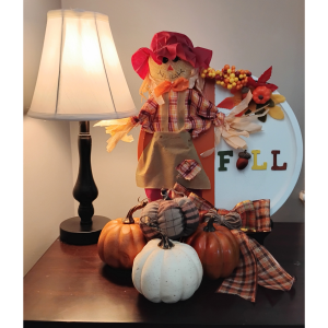 Scarecrow pizza pan displayed.