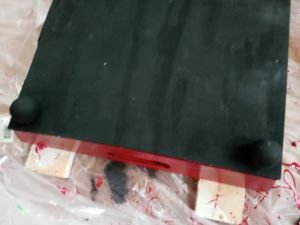 Back board of the tray.