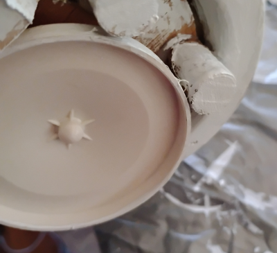 Tan round bottom of music box